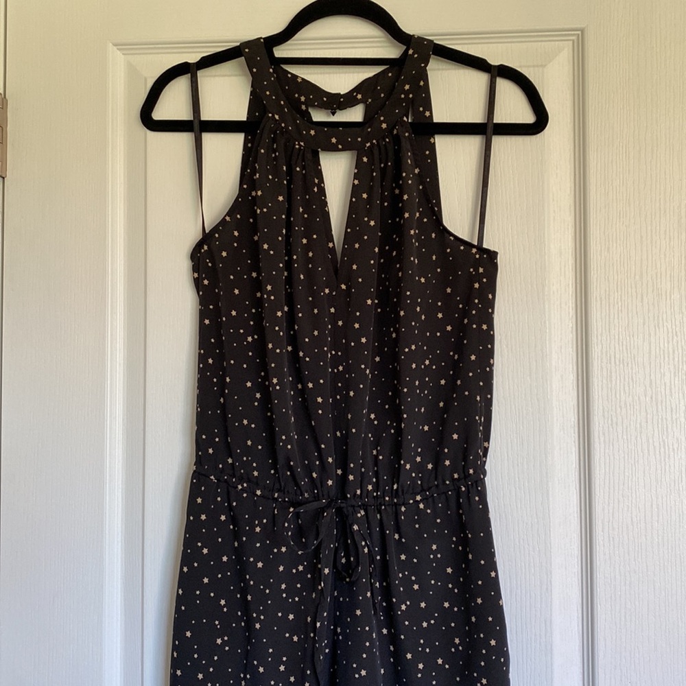 BCBGeneration black jumpsuit with grey stars size S